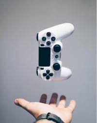 a hand throwing controller in the air